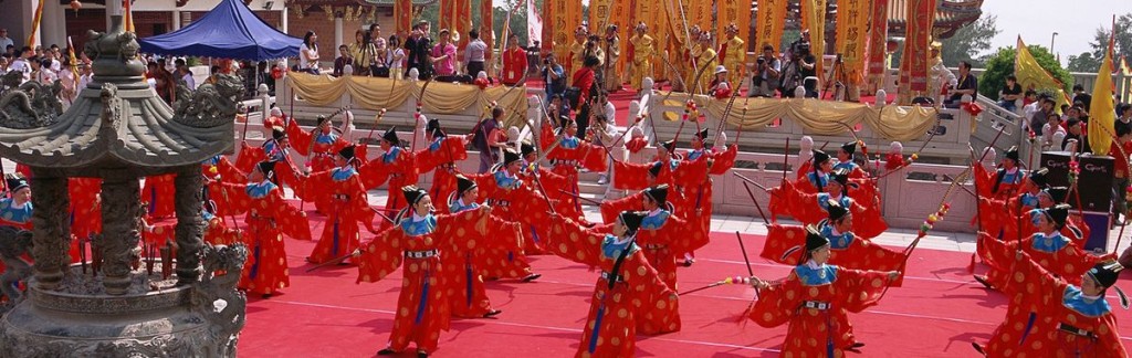 Raging colours: a glamorous traditional performance in Macau.