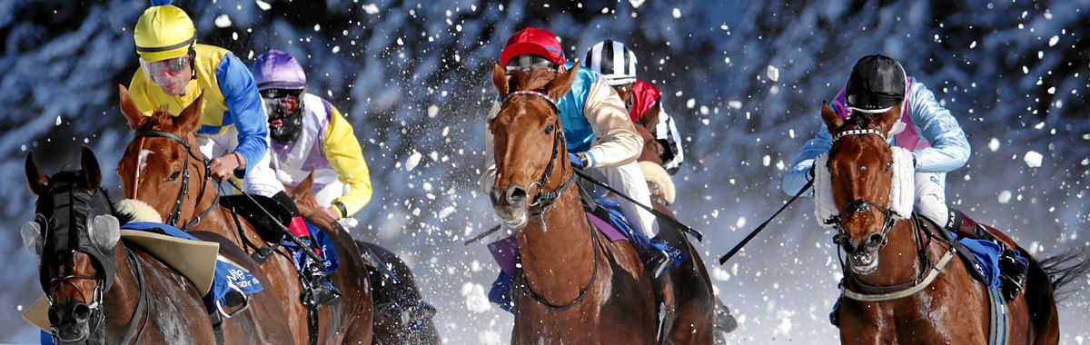 Horses galopping in the snow: The White Turf Horse Race in St. Moritz.