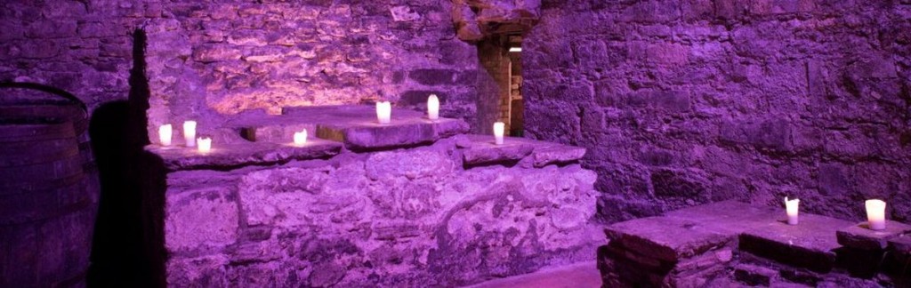 Doused in purple light: A restaurant in the Caves in Edinburgh's underground.