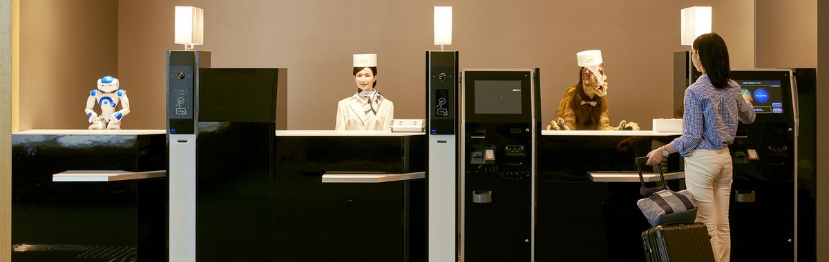 Robots working at a hotel reception in Nagasaki.